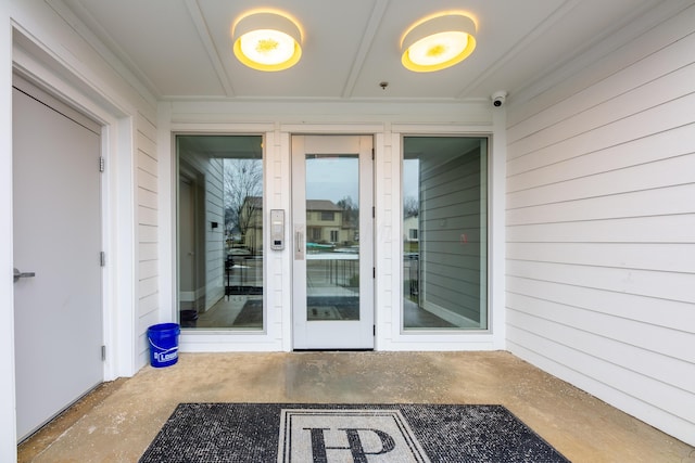 property entrance with a patio area