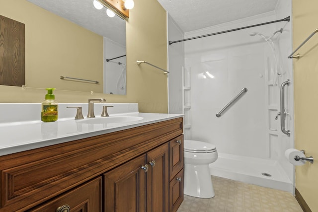 bathroom featuring vanity, toilet, a textured ceiling, and walk in shower