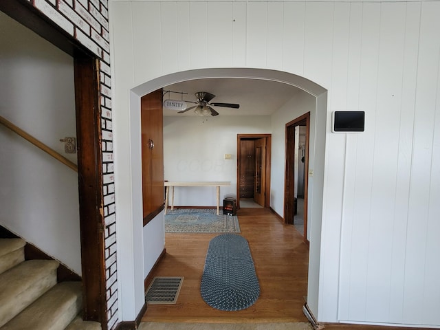 corridor featuring hardwood / wood-style floors