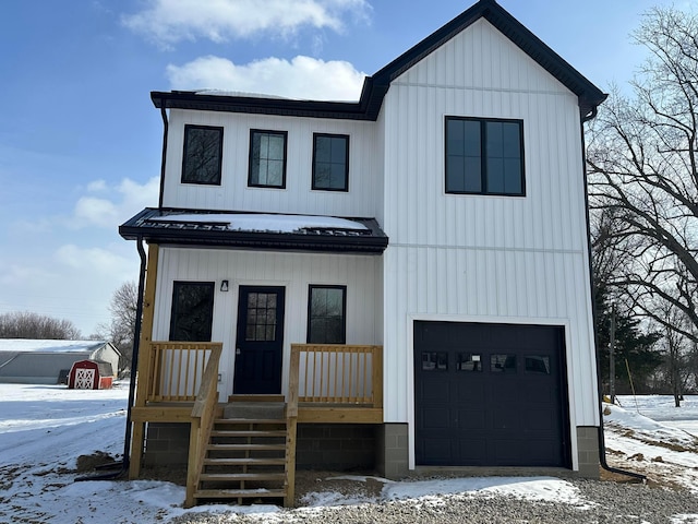 modern farmhouse featuring a garage