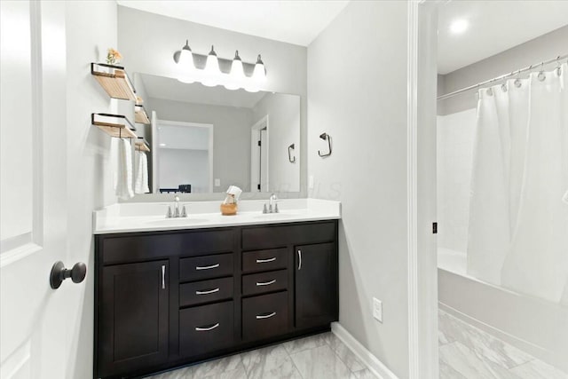 bathroom with vanity and shower / bathtub combination with curtain