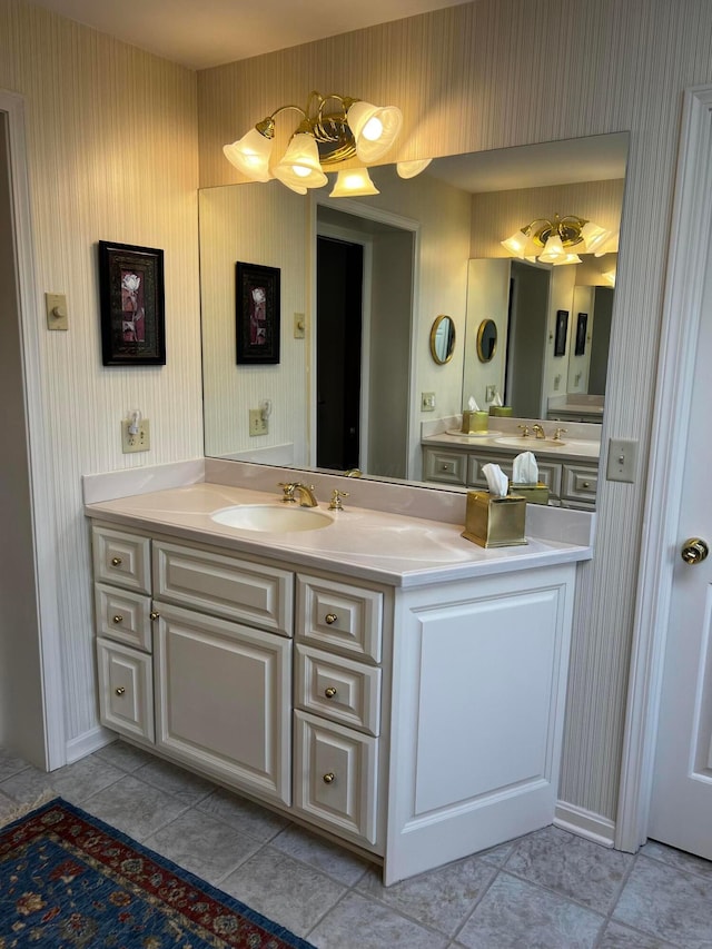 bathroom with vanity and tile patterned flooring