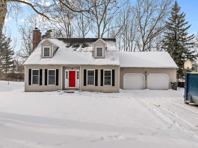 cape cod-style house with a garage