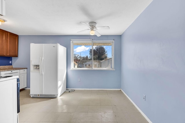 kitchen with ceiling fan and white appliances