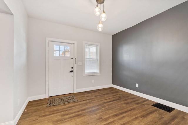 foyer featuring dark hardwood / wood-style floors