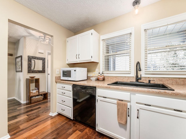 kitchen with sink, dark wood-type flooring, black dishwasher, a textured ceiling, and white cabinets