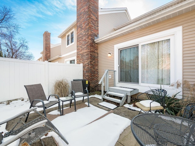 view of snow covered patio