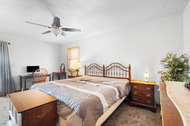 carpeted bedroom with a textured ceiling and ceiling fan