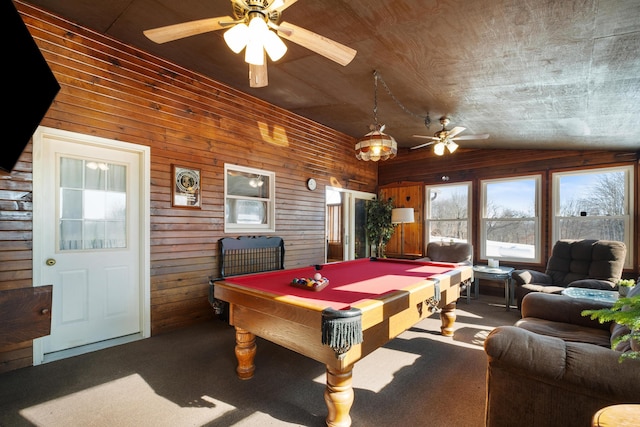 rec room with wood ceiling, carpet flooring, wooden walls, and vaulted ceiling