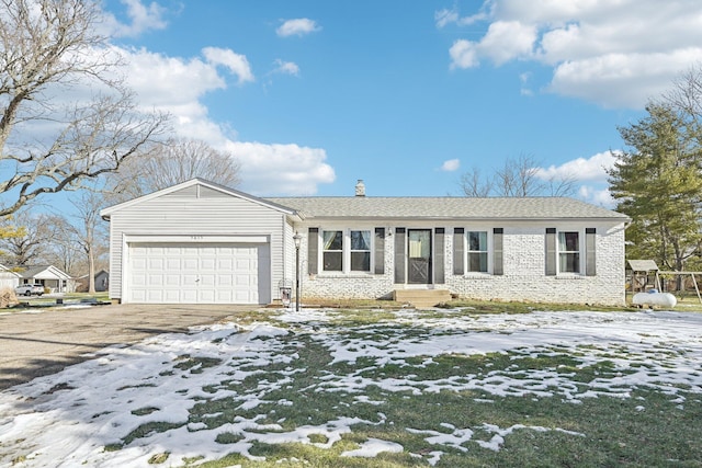 single story home featuring a garage