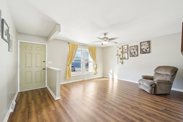 entrance foyer with dark hardwood / wood-style flooring and ceiling fan