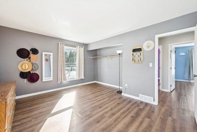 interior space with dark wood-type flooring