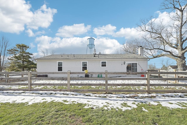 view of snow covered house