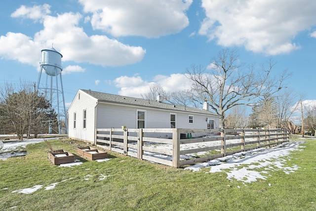 view of home's exterior featuring a yard