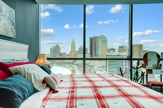 bedroom featuring a wall of windows