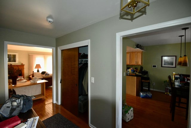 hallway featuring hardwood / wood-style flooring