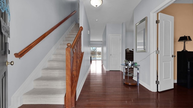 stairs with wood-type flooring