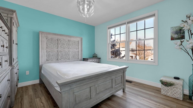 bedroom featuring light hardwood / wood-style floors