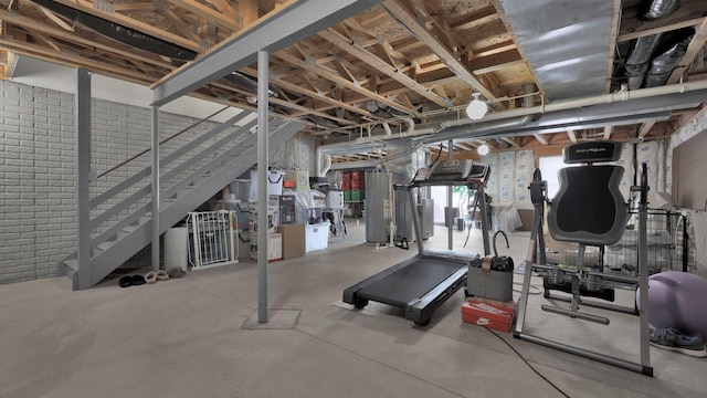 exercise area featuring water heater