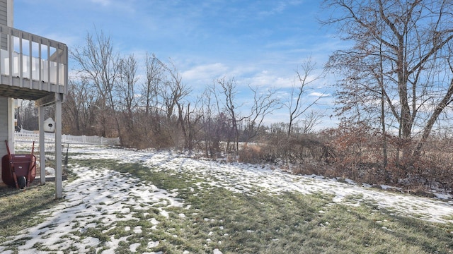 view of yard covered in snow