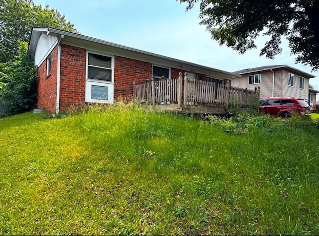 view of front of house with a wooden deck