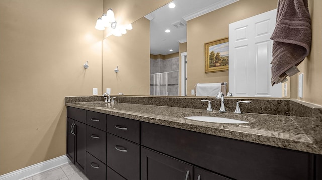 bathroom featuring walk in shower, tile patterned floors, vanity, and ornamental molding