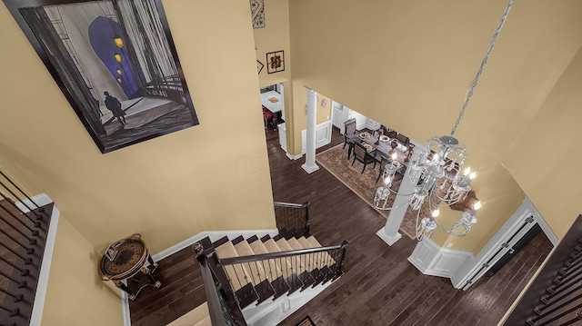 stairway featuring hardwood / wood-style floors