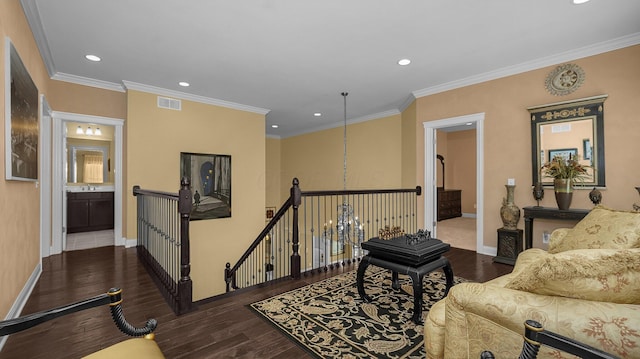 interior space with sink, ornamental molding, and dark hardwood / wood-style floors