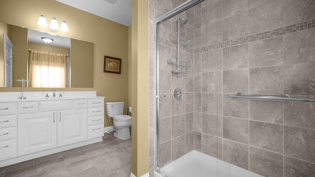 bathroom with vanity, an enclosed shower, tile patterned flooring, and toilet