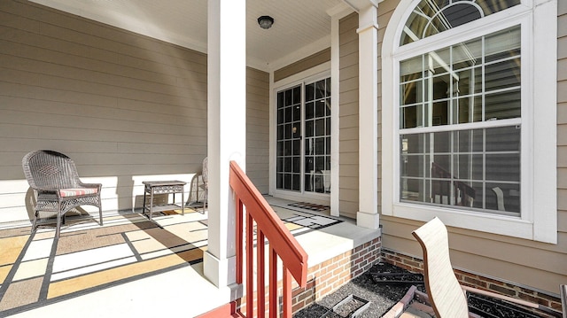 doorway to property with covered porch