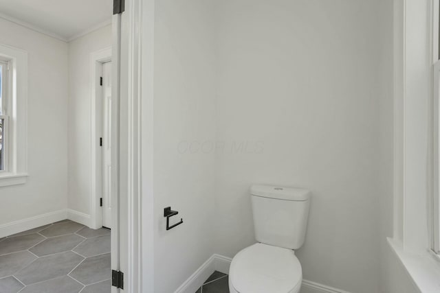 bathroom featuring tile patterned floors and toilet