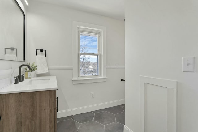 bathroom with vanity and tile patterned flooring