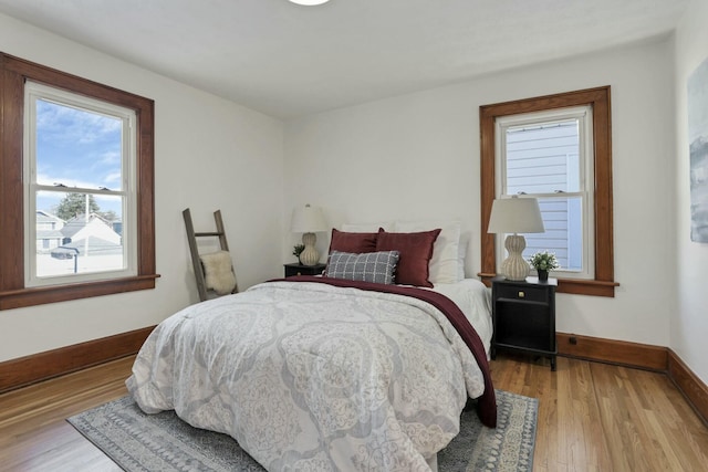 bedroom featuring light wood-type flooring