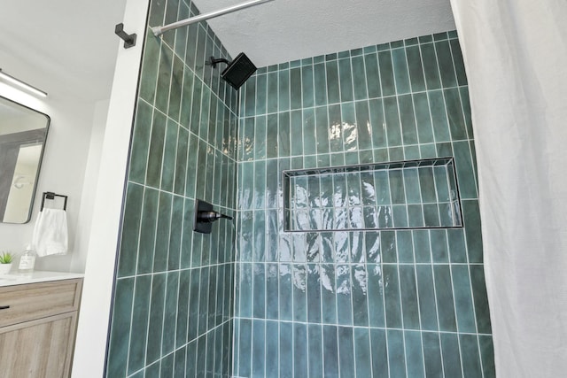 bathroom with vanity and curtained shower