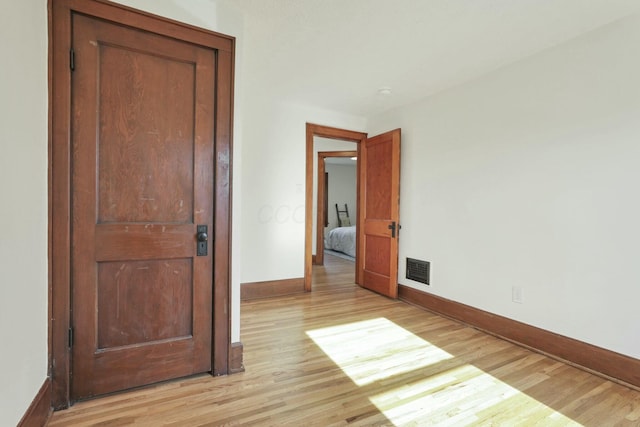 unfurnished bedroom with light hardwood / wood-style flooring