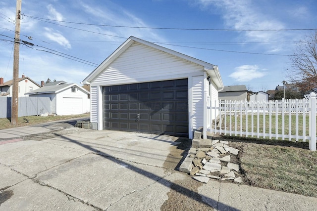 garage with a yard