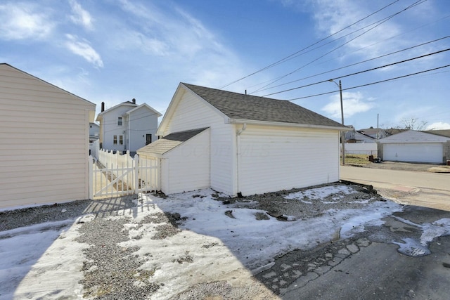 view of snow covered garage