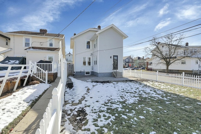 view of snow covered property