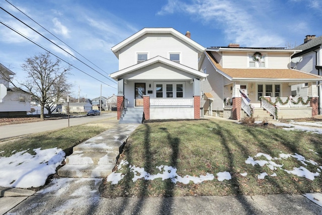 view of front of home featuring a porch and a front yard