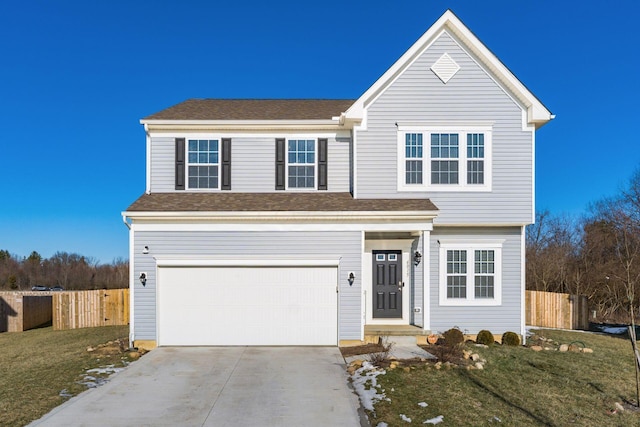 front of property with a garage and a front lawn