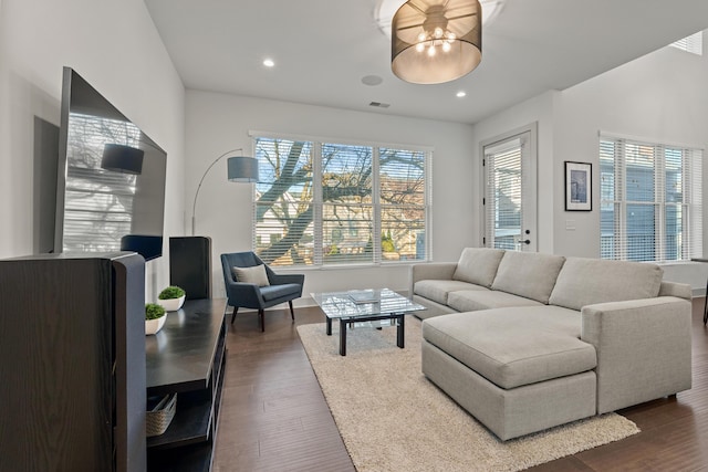 living room with dark hardwood / wood-style floors