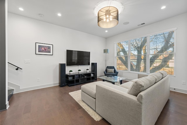 living room featuring dark hardwood / wood-style floors