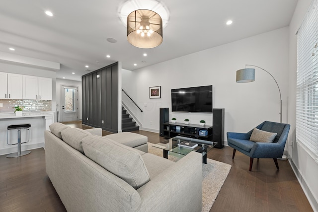 living room with dark hardwood / wood-style floors