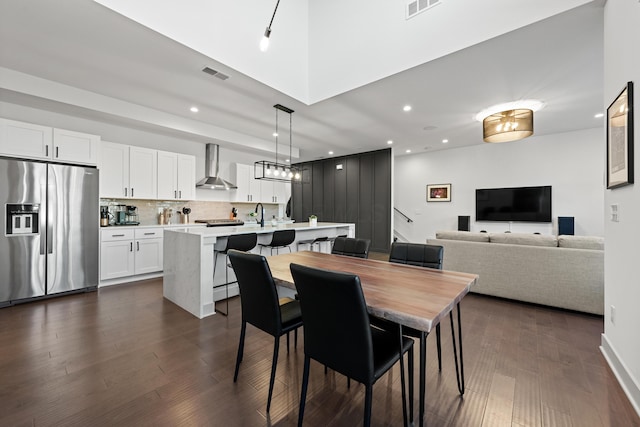 dining room featuring dark hardwood / wood-style flooring