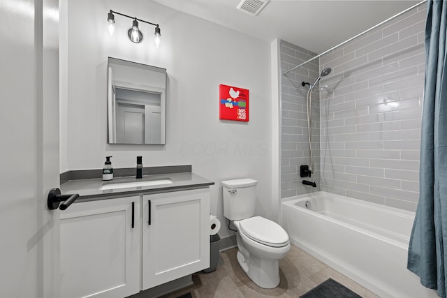 full bathroom with tile patterned floors, vanity, toilet, and shower / bath combo