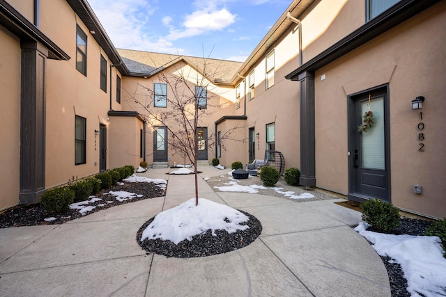 view of snow covered patio