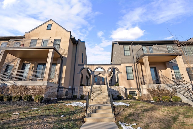 exterior space featuring a balcony