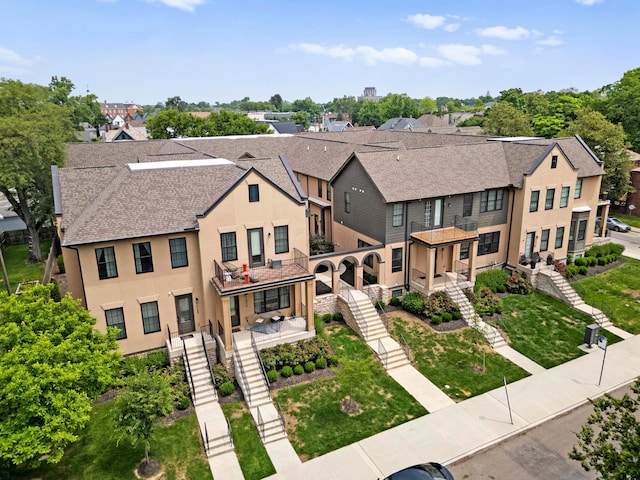 1078 Bryden Rd Unit 6, Columbus, OH 43205 - view of front of home featuring stairs, a residential view, stucco siding, and a shingled roof