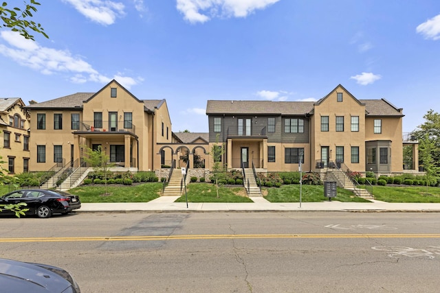1078 Bryden Rd Unit 6, Columbus, OH 43205 - view of property featuring stairway and stucco siding