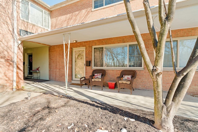 back of property featuring a patio